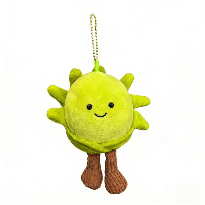 Green spiky round plush keychain charm with smiling face and corduroy legs