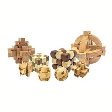 Eight wooden burr brain teaser puzzles in assorted shapes