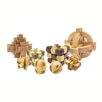 Eight wooden burr brain teaser puzzles in assorted shapes