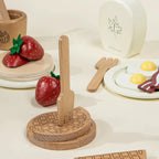 Wooden play waffles, strawberries, fried egg, and bacon from the brunch set