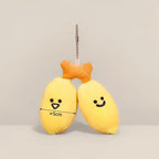 Two-banana plush keychain charm with smiling faces on a ball chain