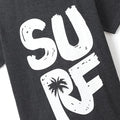 Close-up of dark gray boys tee with white SURF lettering and palm tree graphic
