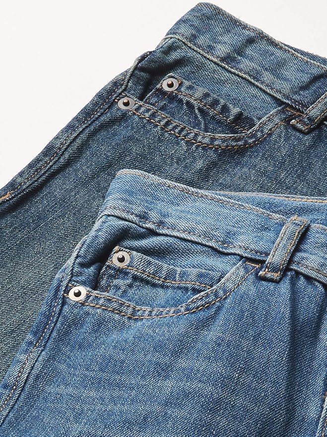 Close-up of front five-pocket detail on boys straight leg jeans in two washes