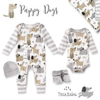 Puppy Dogs print romper shown with a matching bodysuit, hat, and booties from the same line