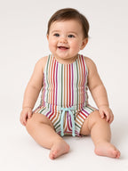 Baby in a rainbow stripe tank with matching striped drawstring shorts