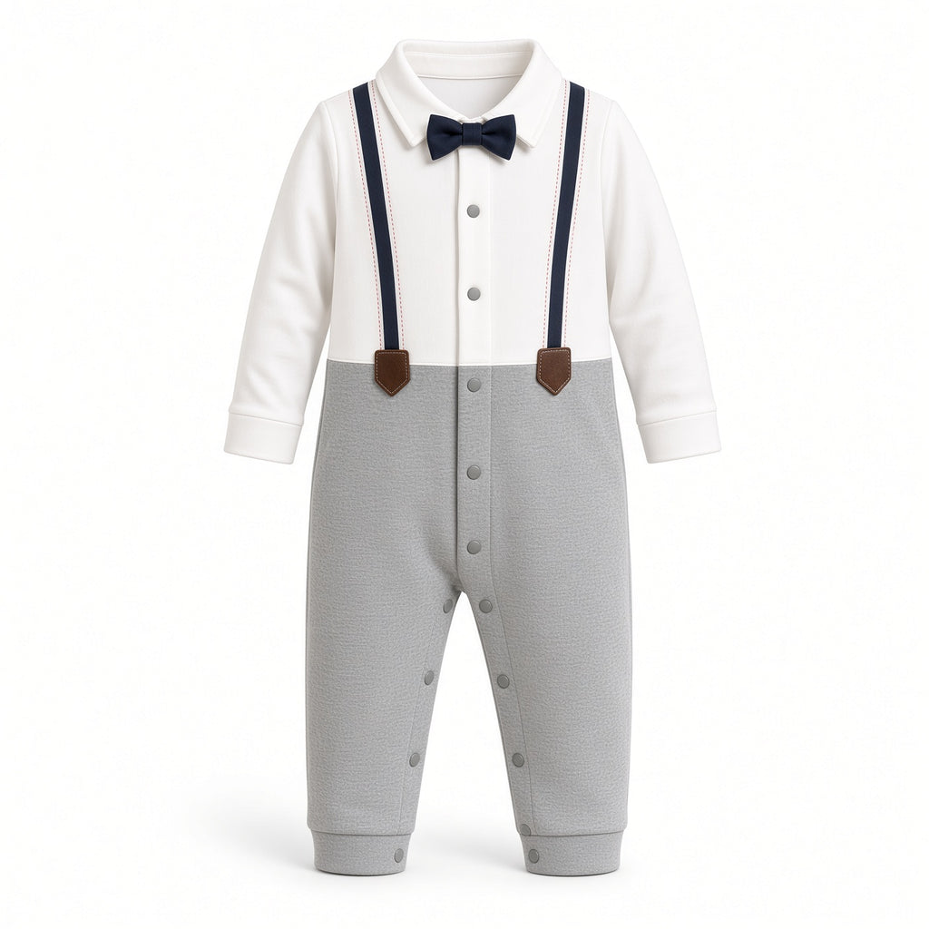 Baby tuxedo romper with white collared top, navy bow tie and suspenders, and gray snap legs, front view