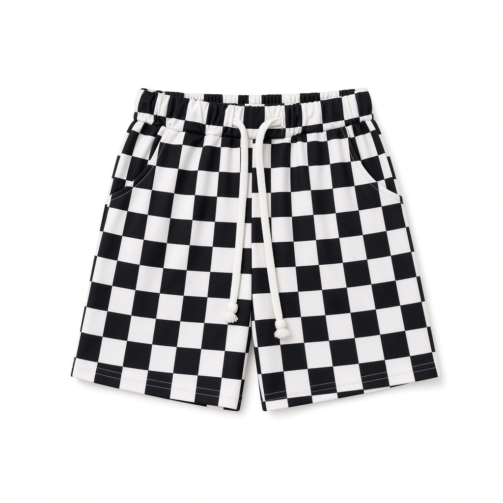 Kids black and white checkered drawstring shorts with pockets, front view