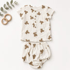 Baby muslin bear print button shirt and matching bloomers in cream, flat lay