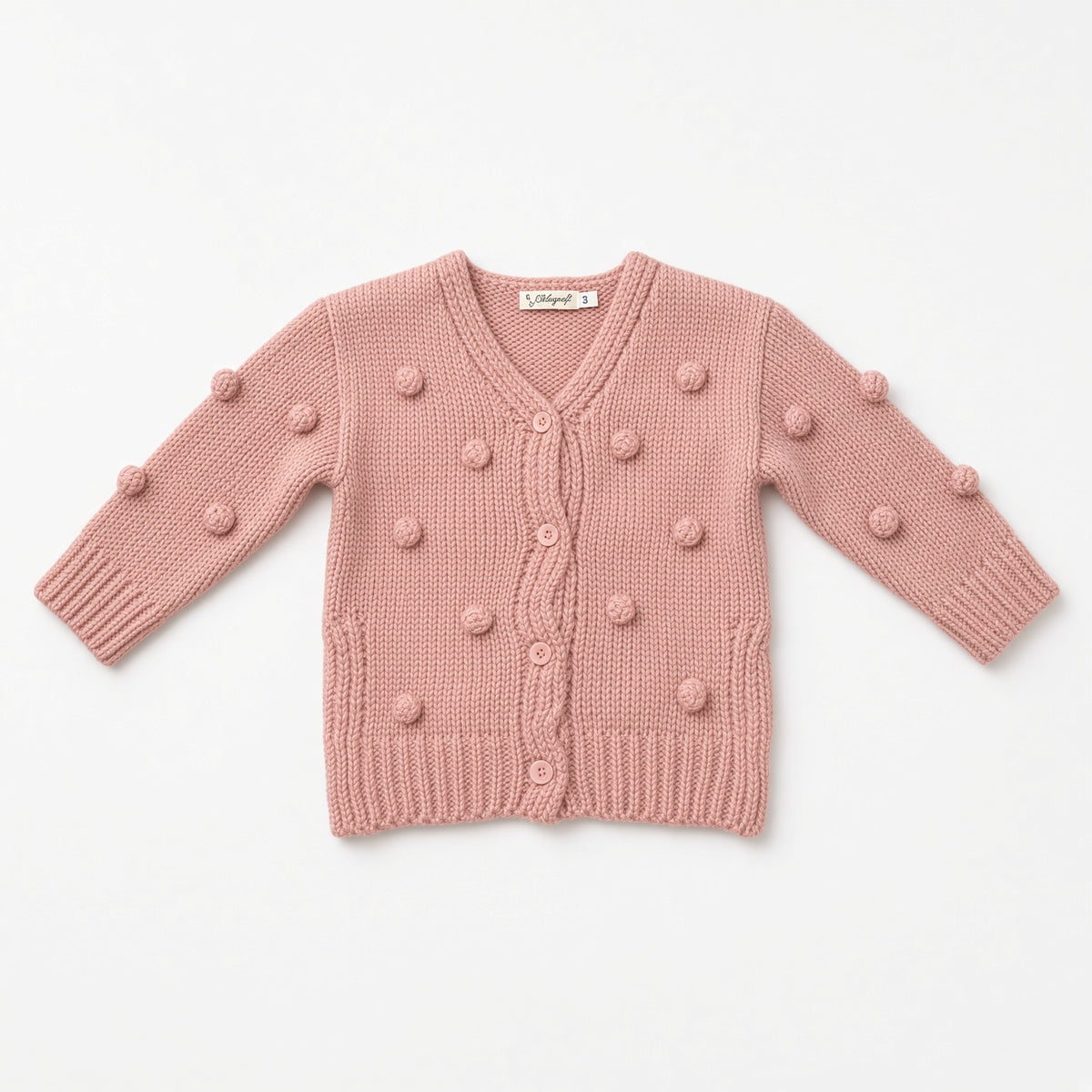 Pink knit baby cardigan with bobble pom-pom texture and buttons, flat view