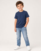Boy wearing a navy solid short-sleeve tee and jeans