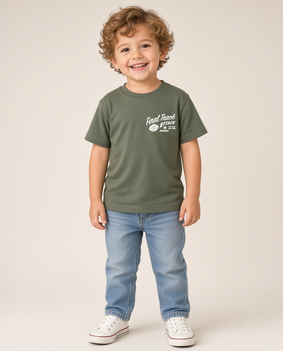 Boy wearing the Little Rad Things Final Track Attack military green tee with jeans