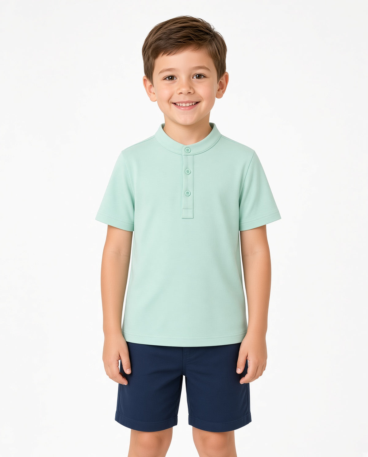 Boy wearing a mint green short-sleeve button placket shirt with navy shorts