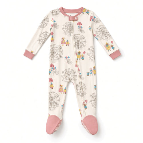 Cream baby footed zip sleeper with Ferris wheel carnival print and pink feet, front view