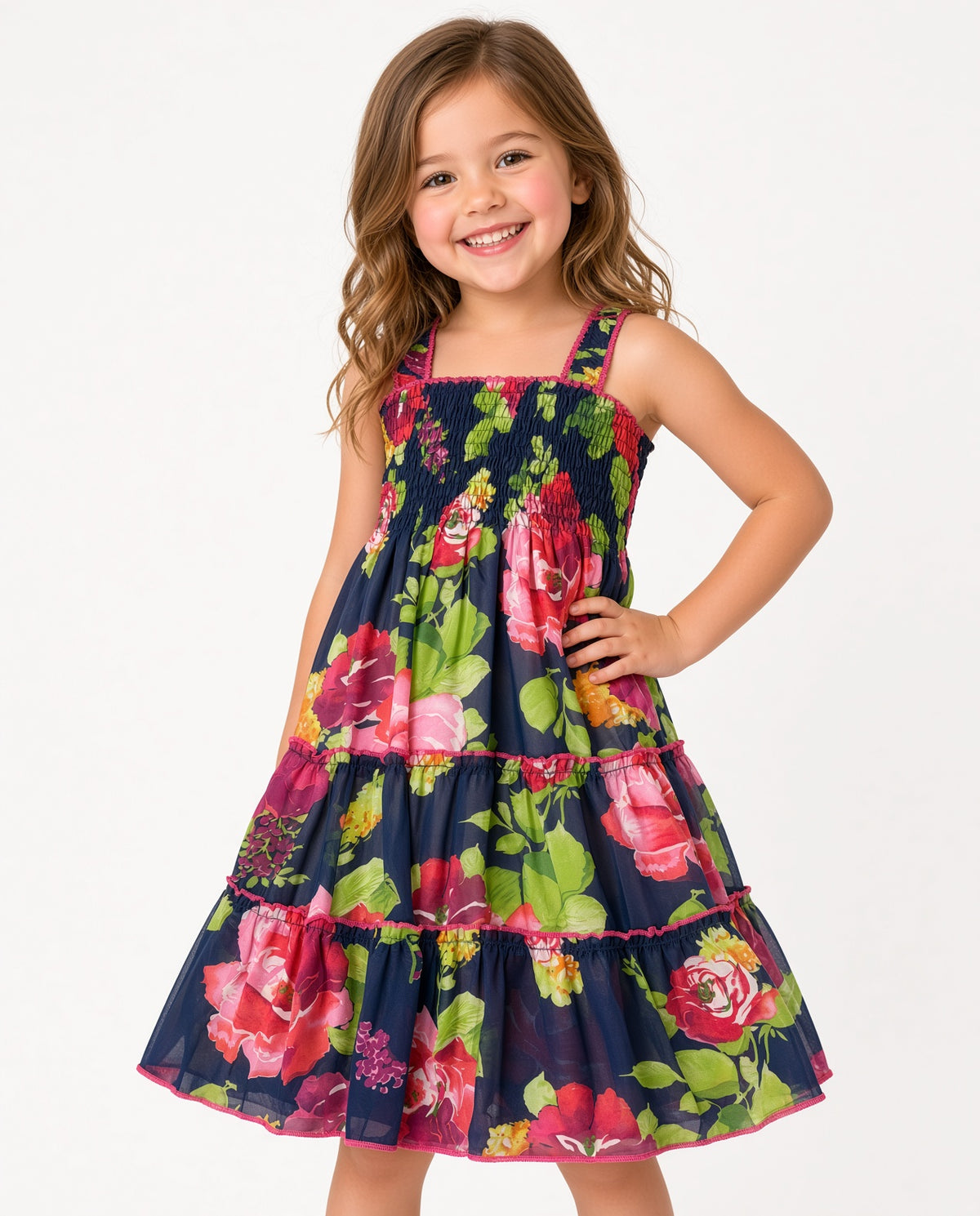 Girl in a navy floral smocked tiered sundress with square neckline