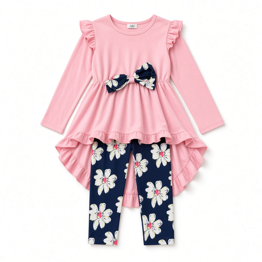 Girls pink ruffle-shoulder high-low tunic with navy bow and navy floral leggings, flat view