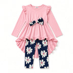 Girls pink ruffle-shoulder high-low tunic with navy bow and navy floral leggings, flat view