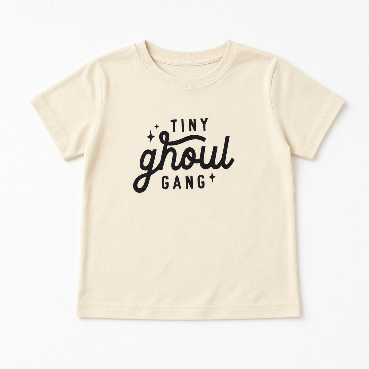Cream baby tee with black Tiny Ghoul Gang lettering, front view
