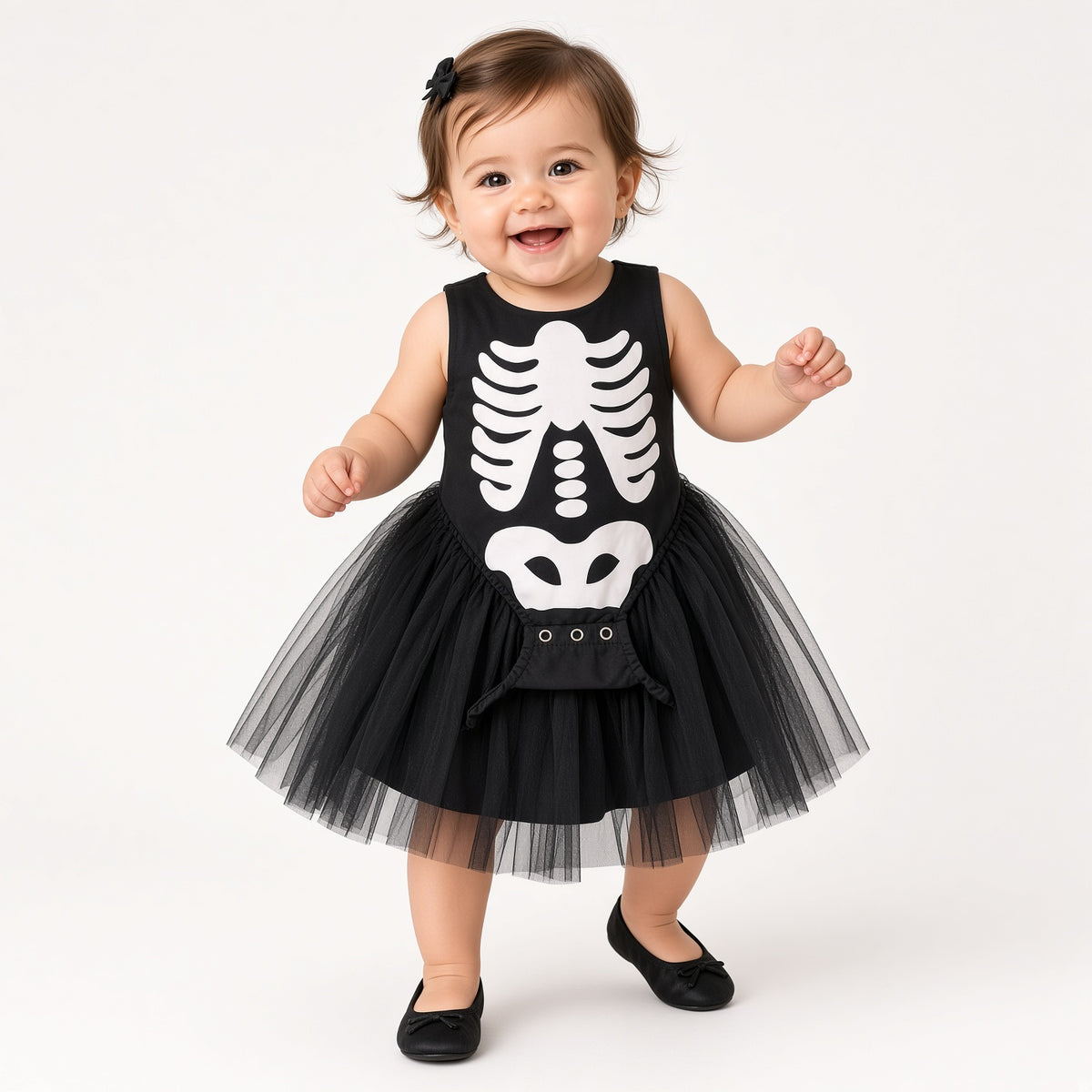 Baby wearing a black skeleton print tutu romper for Halloween