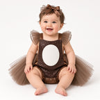 Baby wearing a brown sequin teddy bear tutu romper with white belly and bow
