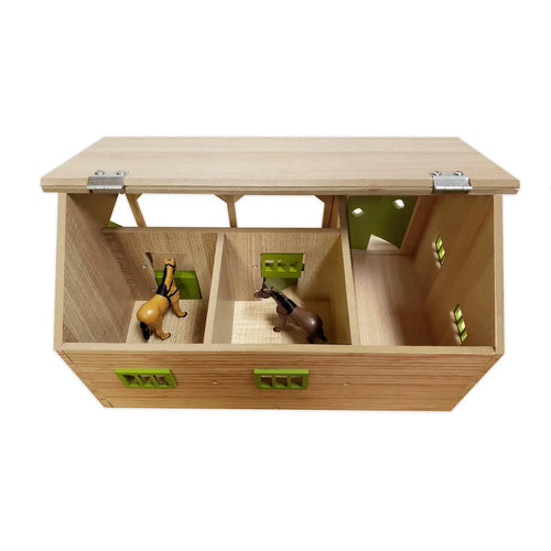Top view of the wooden horse stable with roof lifted, showing two stalls with toy horses and storage bay