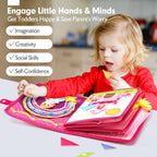 Young child playing with an open activity page of the pink princess felt busy book