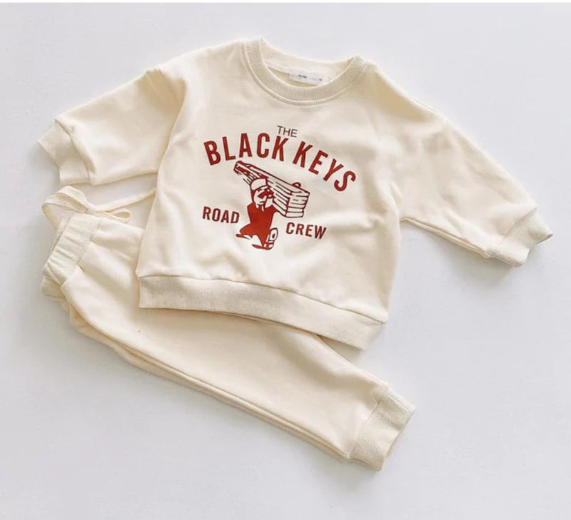 Beige The Black Keys Road Crew toddler sweatsuit, sweatshirt and joggers flat lay