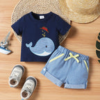 Navy short-sleeve whale appliqué shirt with light blue striped shorts, two-piece set