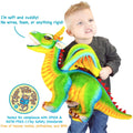 Child holding Drevnar the 29-inch rainbow dragon plush