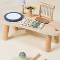 Coco Village wooden musical play station with xylophone, drum, and chimes