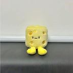Yellow chunky cheese plush charm with smiling face and little feet