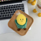 Corn cob plush keychain charm with green husk and smiling face