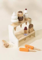 Wooden pretend ice cream stand with cones on top and popsicles on the lower shelf