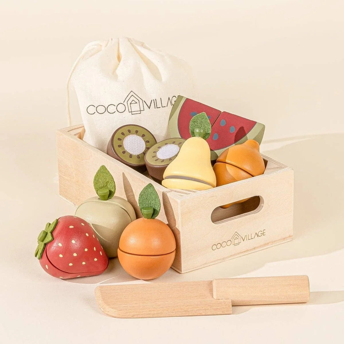 Coco Village wooden fruits playset in a wooden crate with toy knife and cloth bag