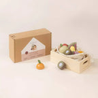 Wooden fruits playset box next to the crate of play fruit